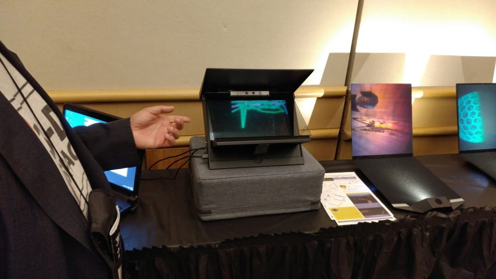 Eric Kurland shows off an interactive 3D hologram prototype.